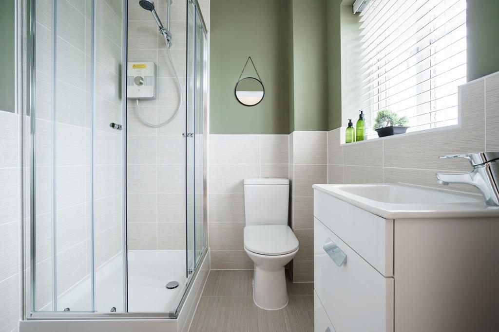 Bedroom one boasts an en-suite shower room