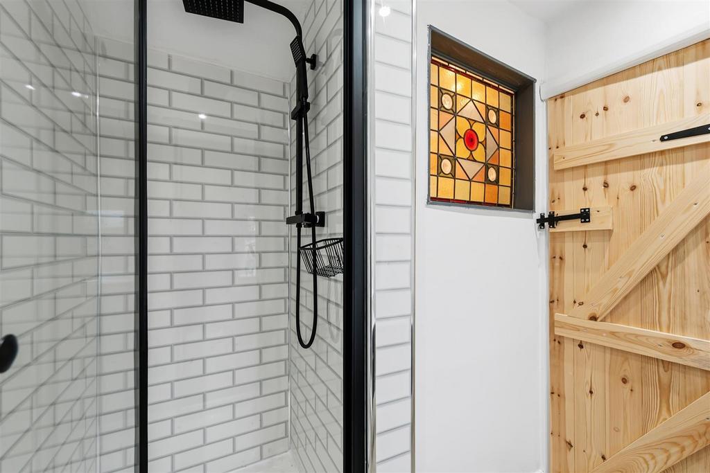 Shower and stained glass window.jpg