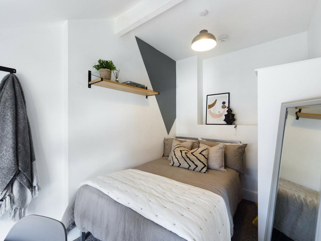 A stylish and inviting double bedroom, perfect ...