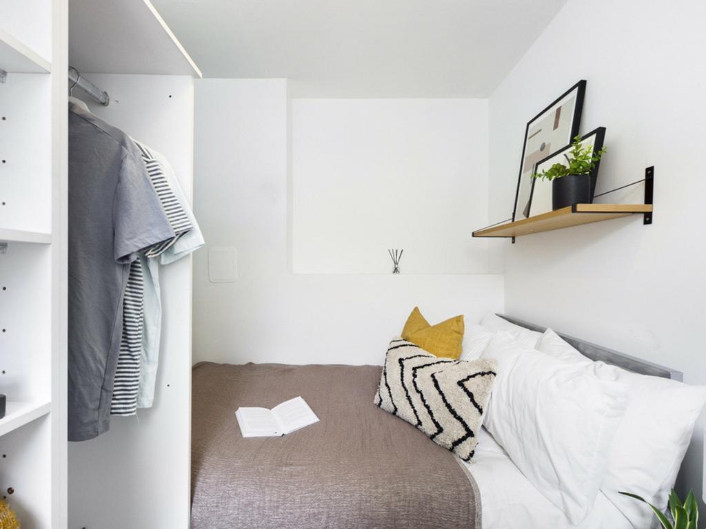 A cozy and inviting double bedroom with stylish...