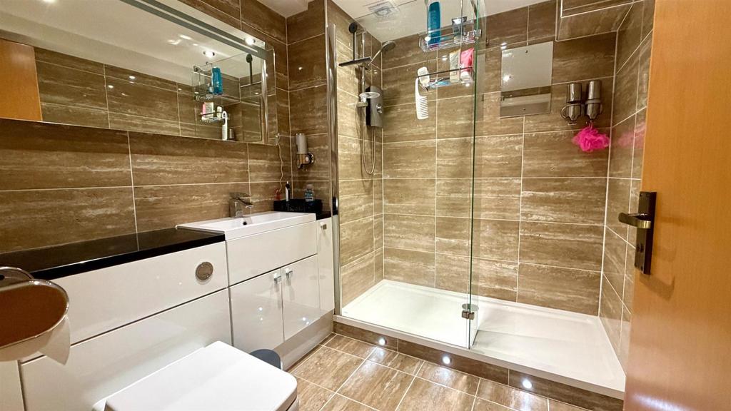 Tiled 3 piece shower room