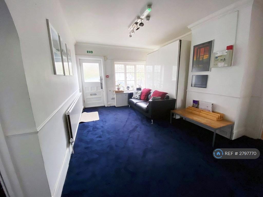 Reception Hallway With Large Leather Sofa
