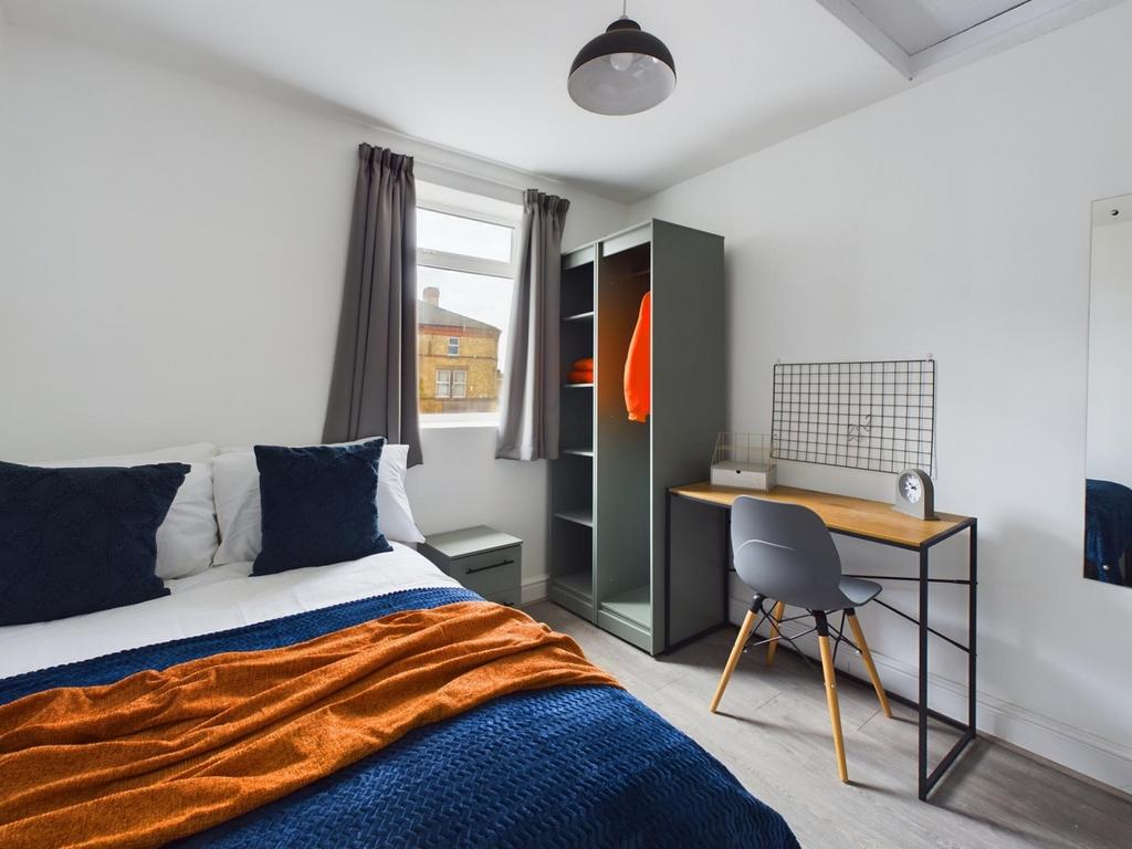 A stylish and inviting double bedroom offering ...