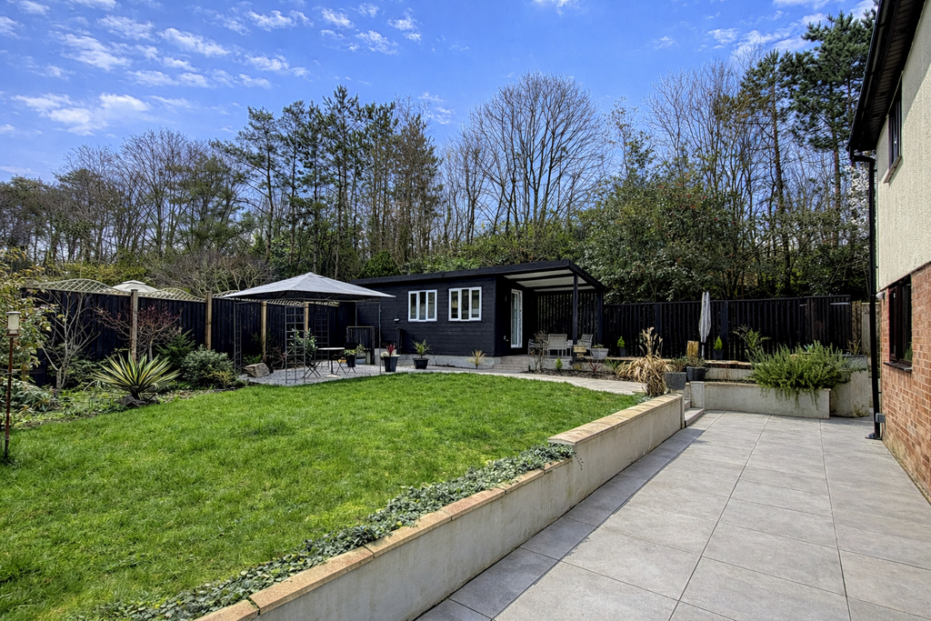 Serene backyard garden with office