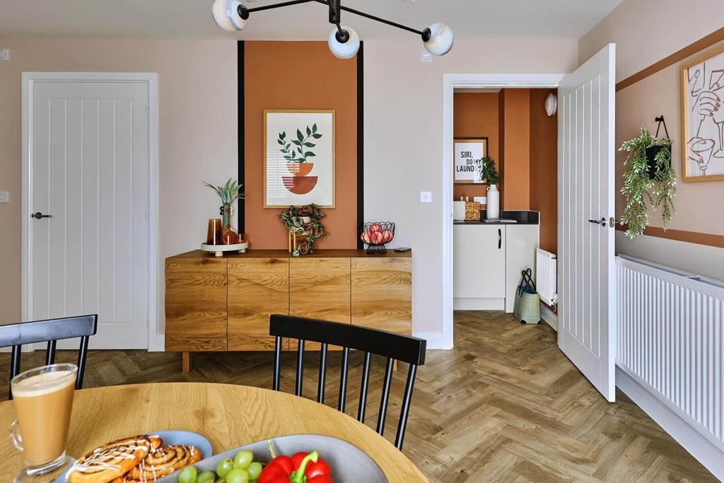 The kitchen and dining area also leads to a...