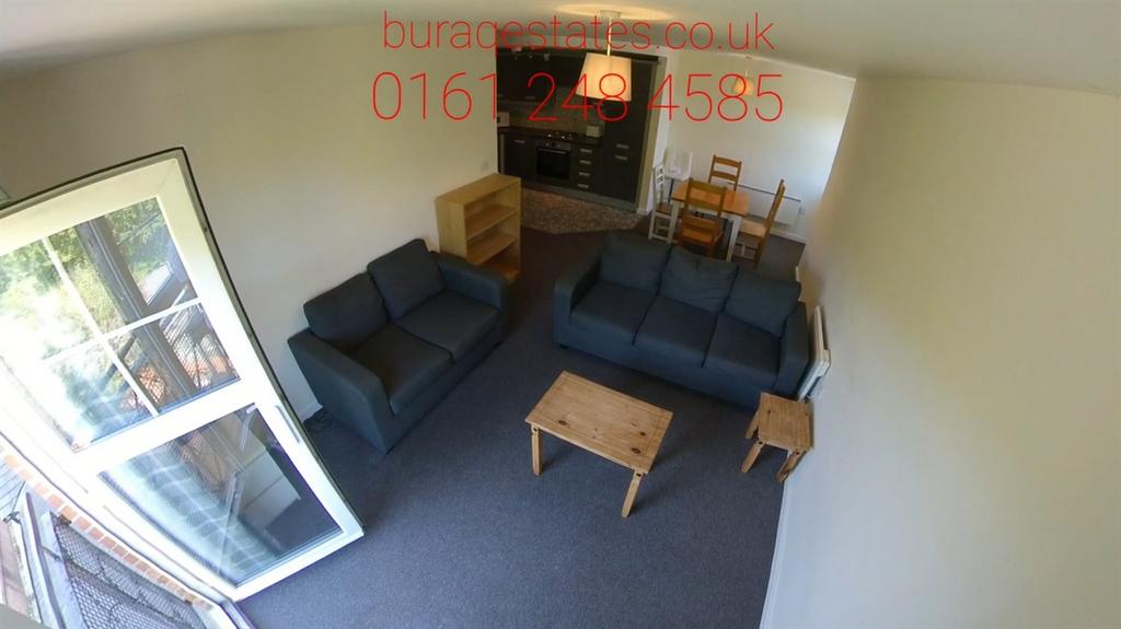 Bright, neutral living room with two sofas, cof...