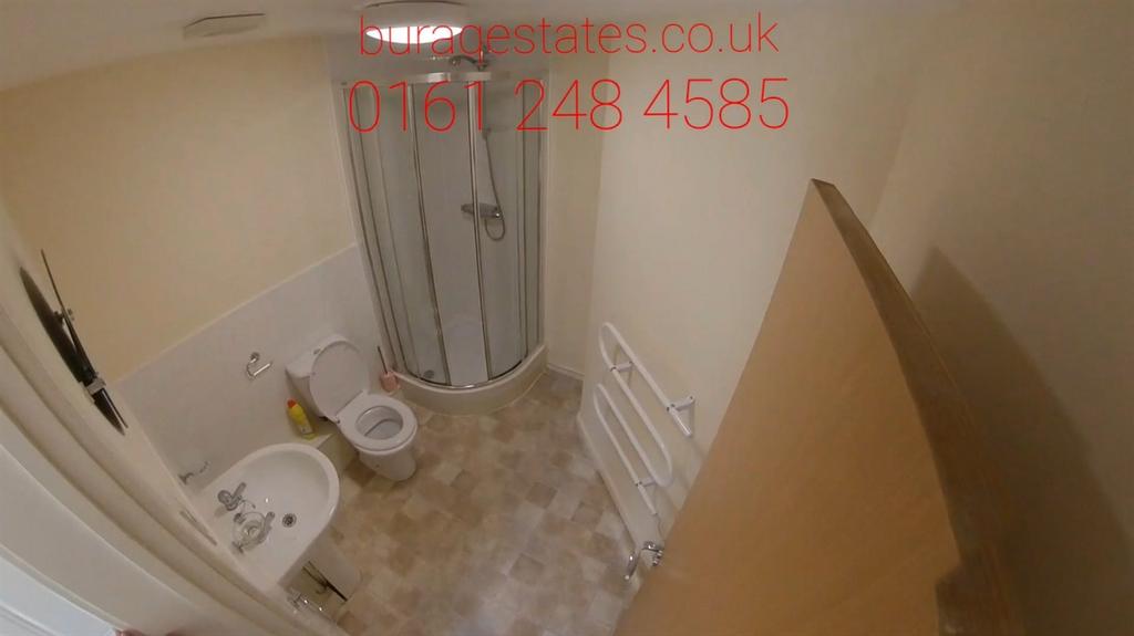 Fresh, modern bathroom featuring a corner showe...