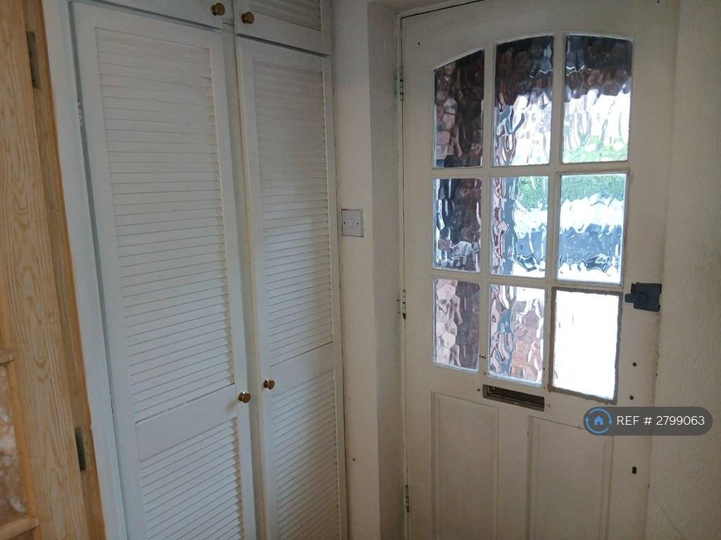 Front Door And Coats Cupboard