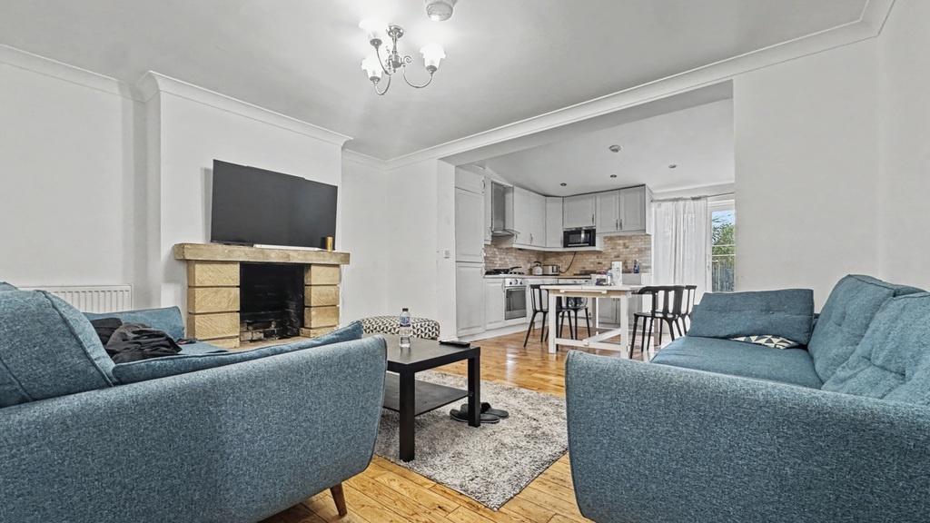 Bright, modern open-plan living area with styli...