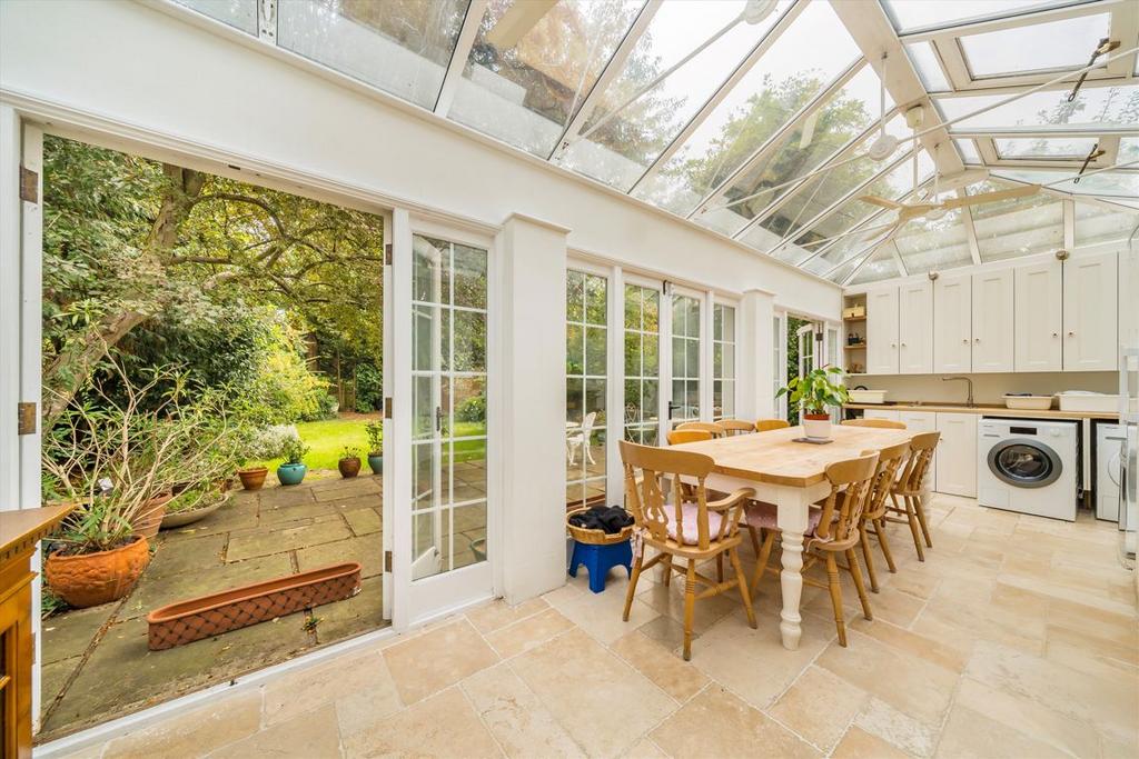 Conservatory interior, conservatory, french doors leading to garden