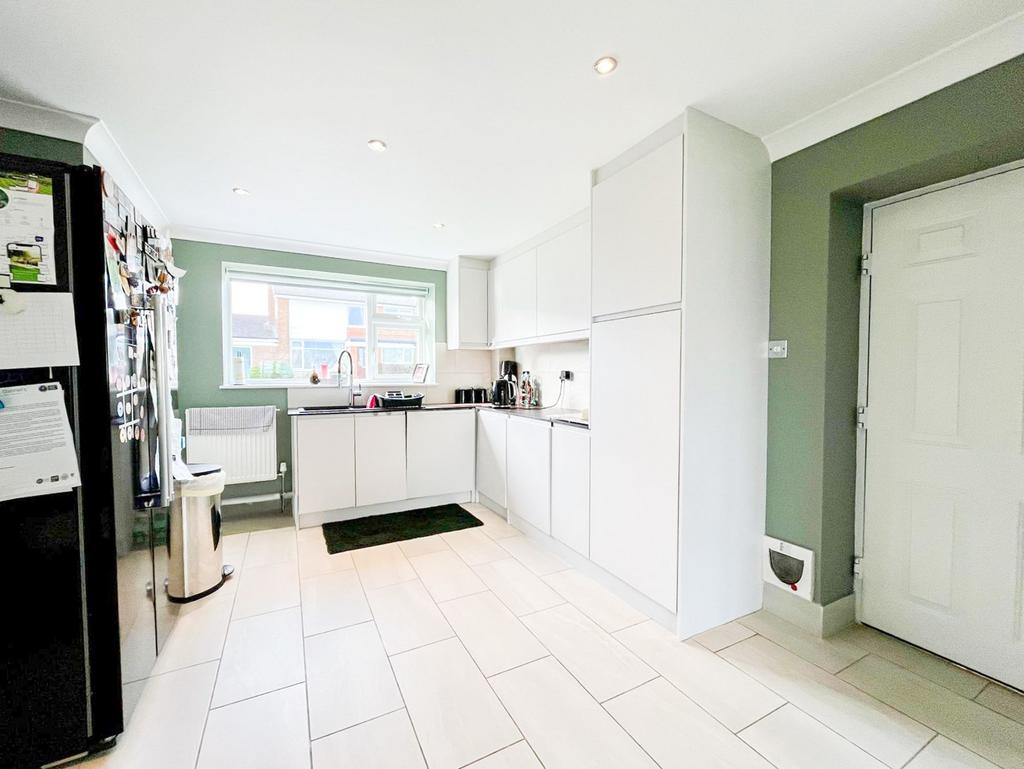 Open plan kitchen diner with fitted appliances