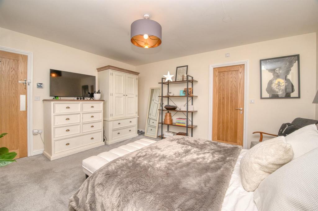 Bedroom One towards landing and en-suite.jpg