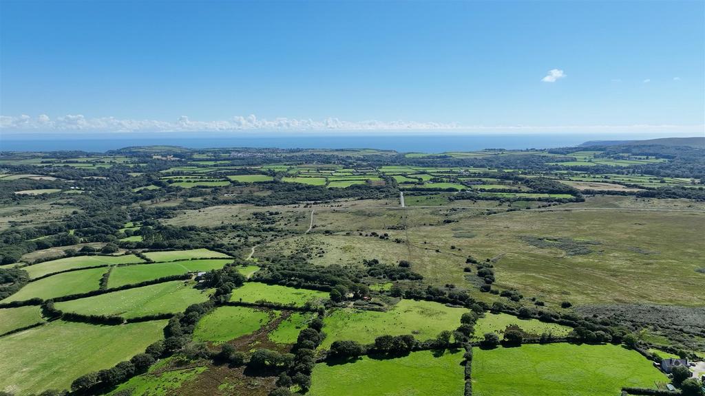 Behind the property looking south.jpg