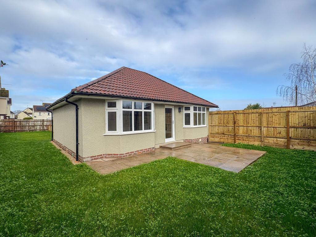 Rear Garden With Wrap Around Gardens