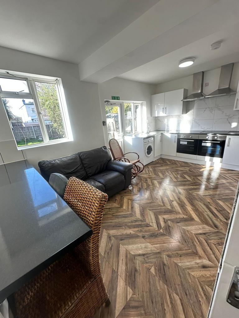 Bright, modern open-plan kitchen/living area wi...