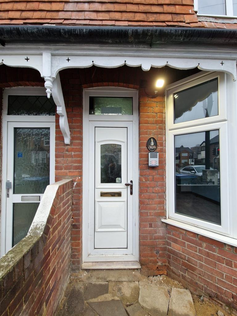 Attractive red-brick terraced property entrance...