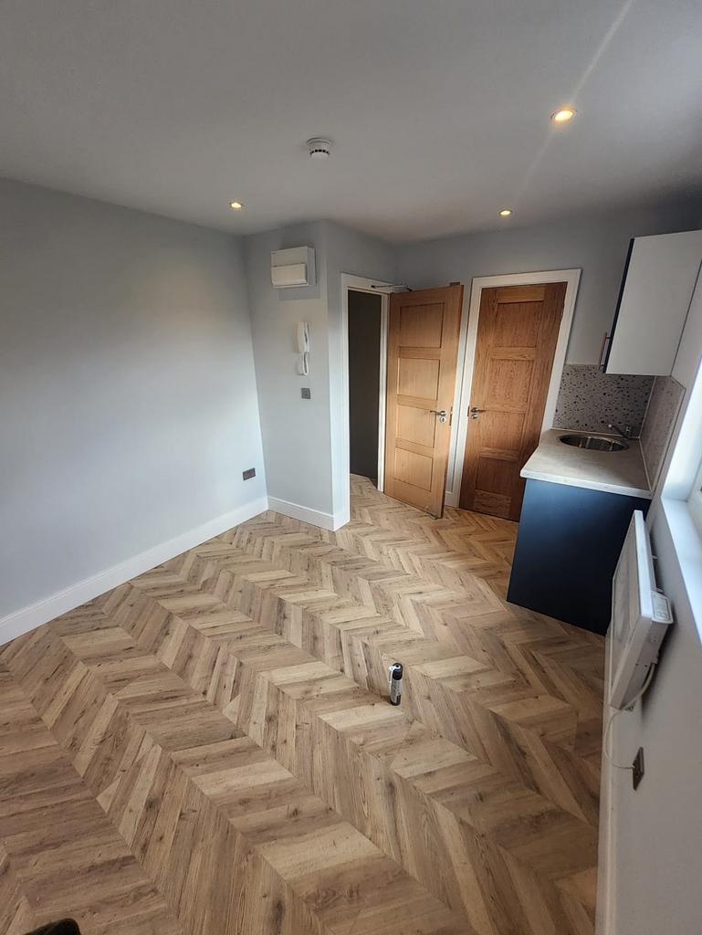 Bright, modern studio-style space with stylish ...