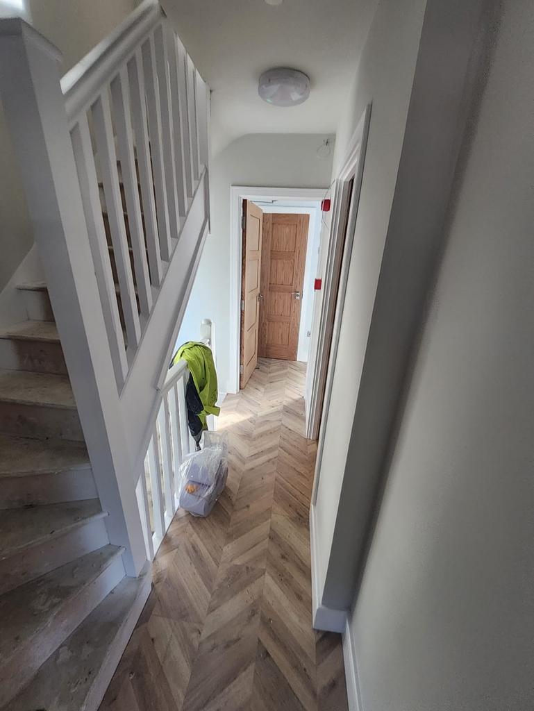 Bright, freshly refurbished hallway with a mode...