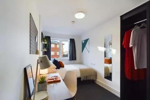 Bright and inviting double bedroom with a comfo...
