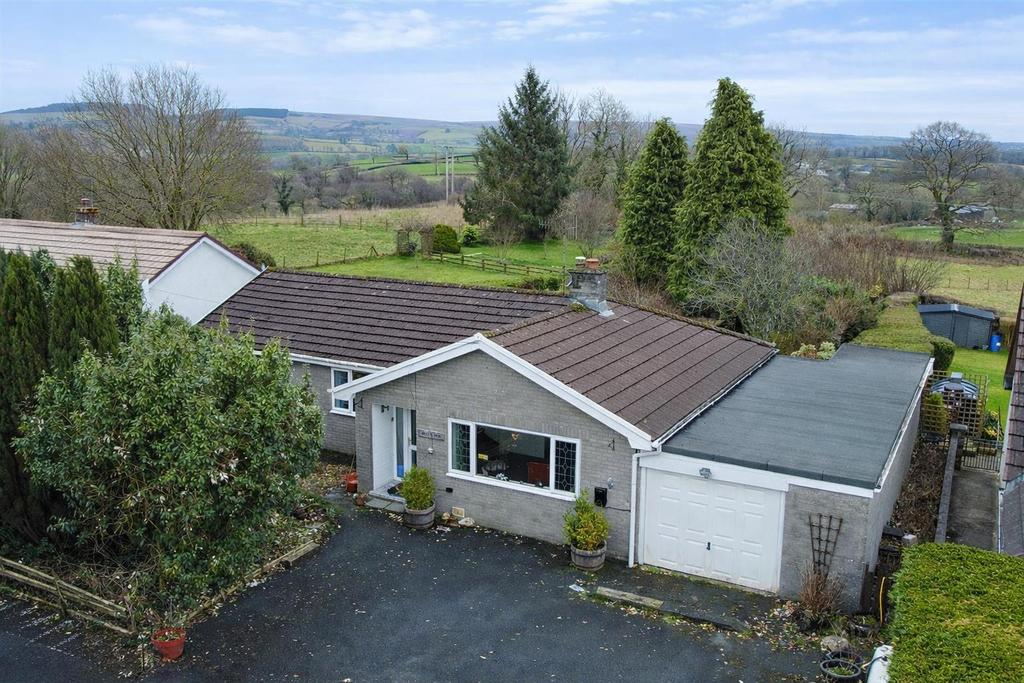Rural bungalow on an overcast day.png
