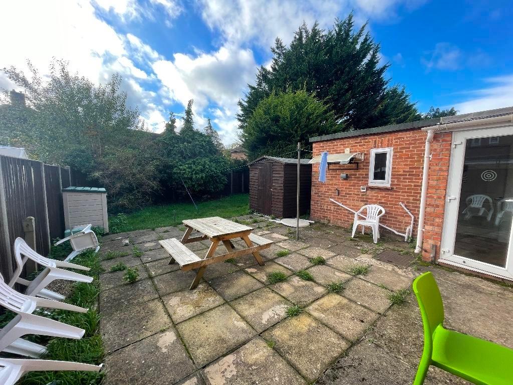 Private rear garden with paved patio, picnic be...