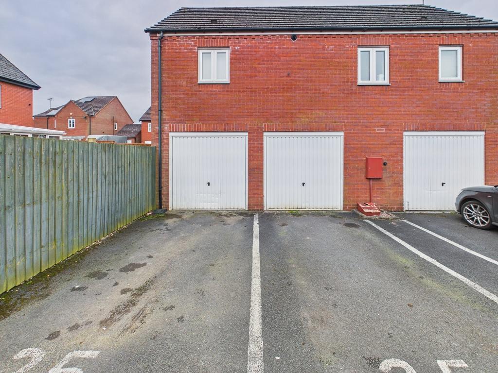 Two parking spaces and two garages