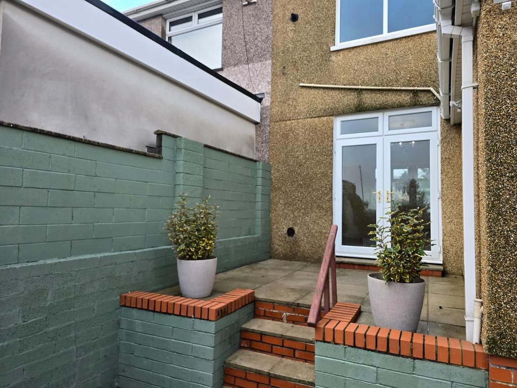 Rear small patio