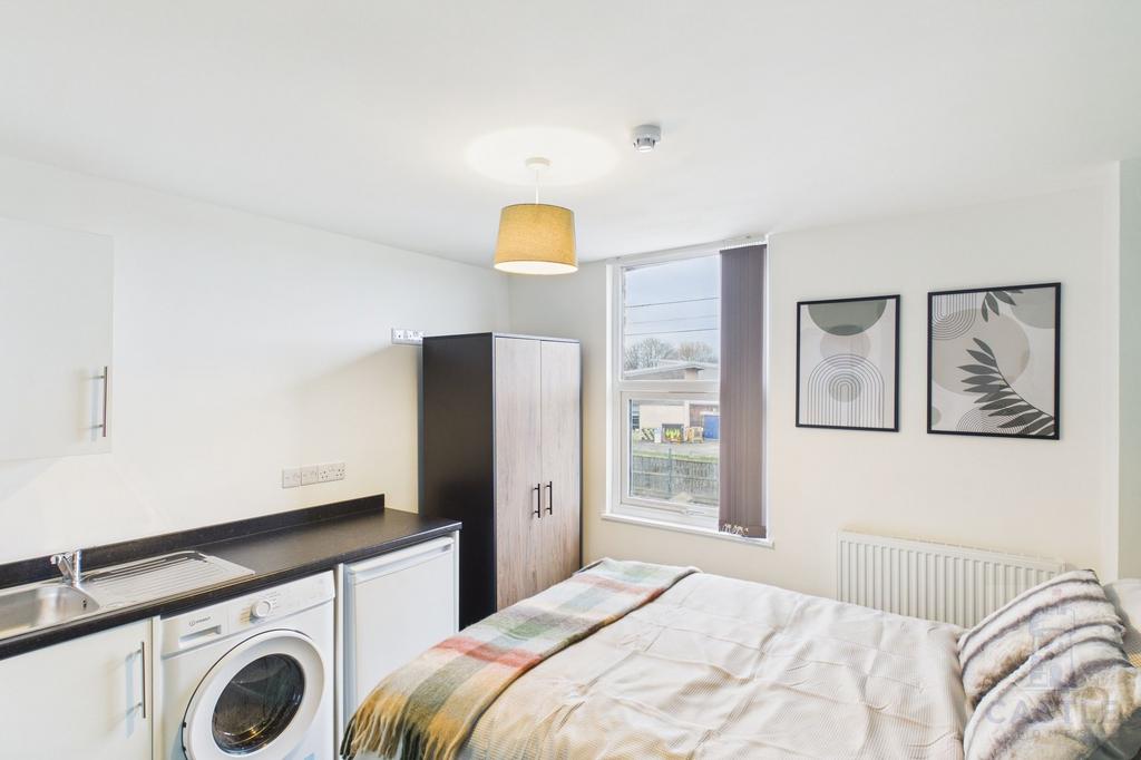 Room 2 or Room 3 (similar layout and size)