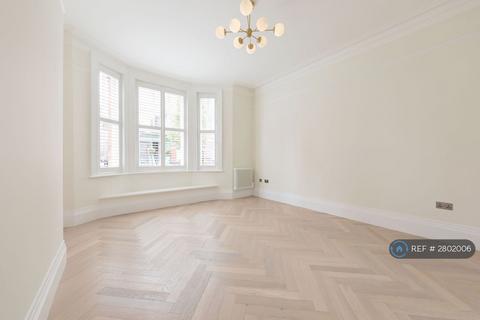 undefined, Langham Street, London, W1W