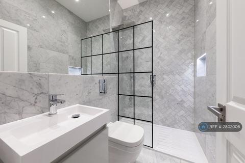 undefined, Langham Street, London, W1W