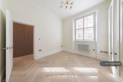 undefined, Langham Street, London, W1W