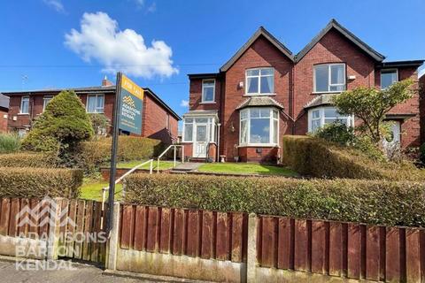 Dewhirst Road, Syke, OL12