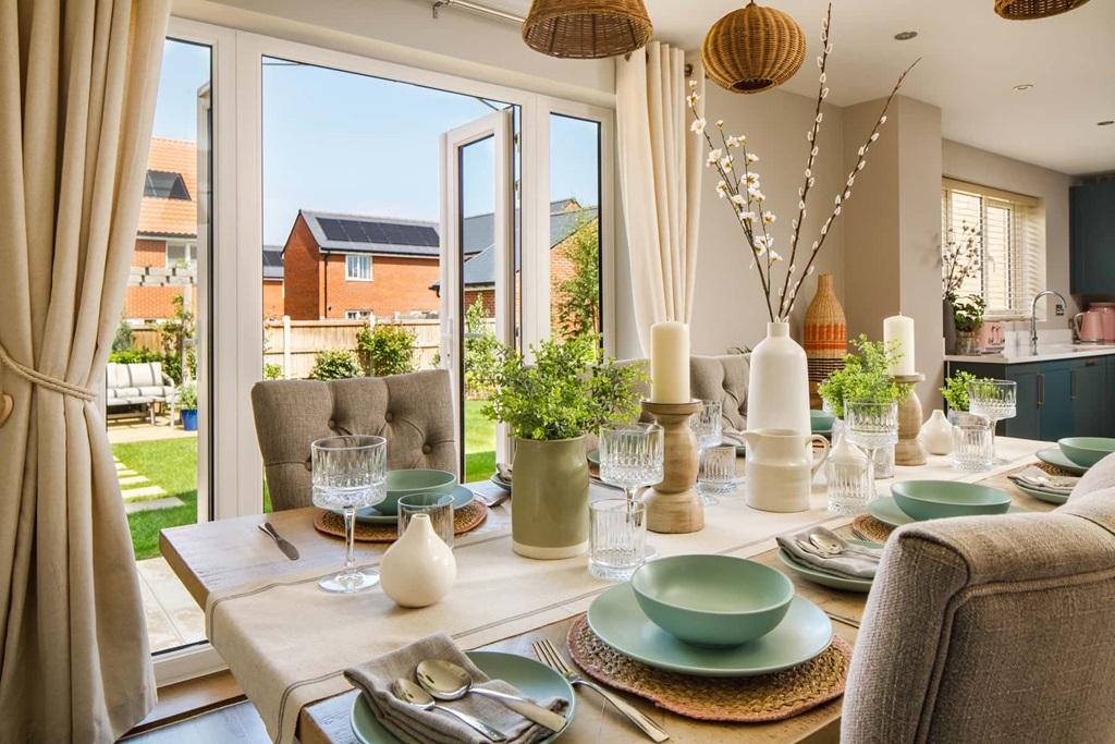 Your dining area looks over your garden through...