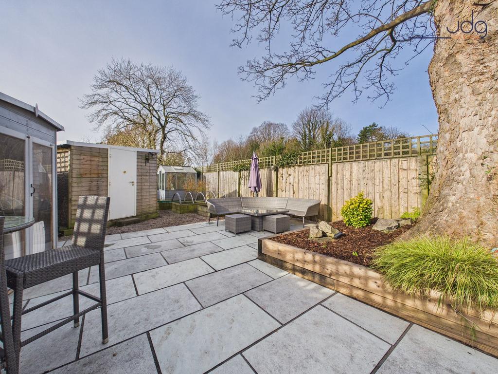 Large Garden with a mixture of lawn and flagged...