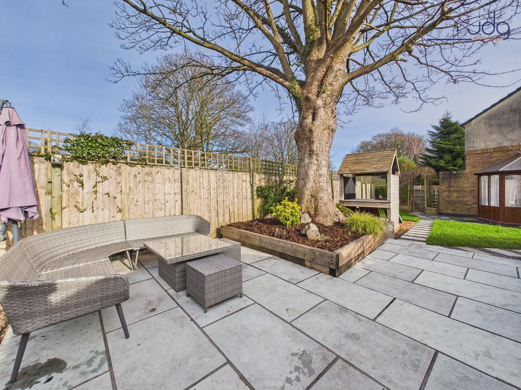 Large Garden with a mixture of lawn and flagged...
