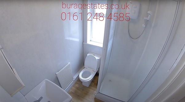Bright, well-kept bathroom with a corner shower...