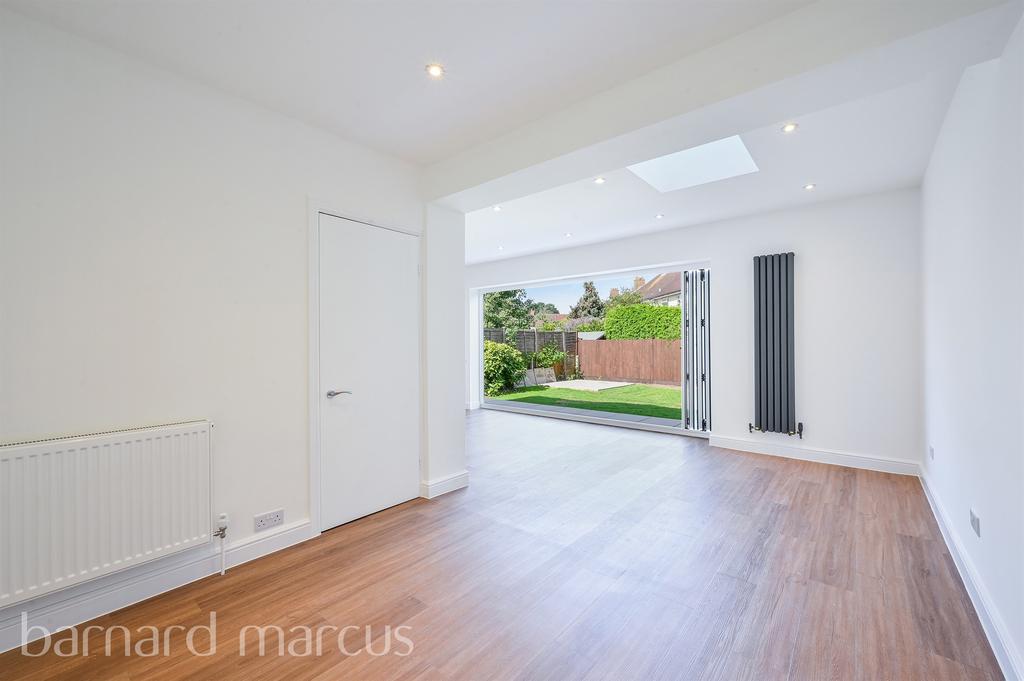 Conservatory interior, french doors leading to garden