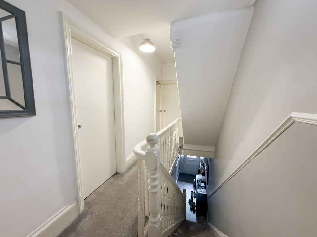 Bright, well-maintained staircase and first-flo...