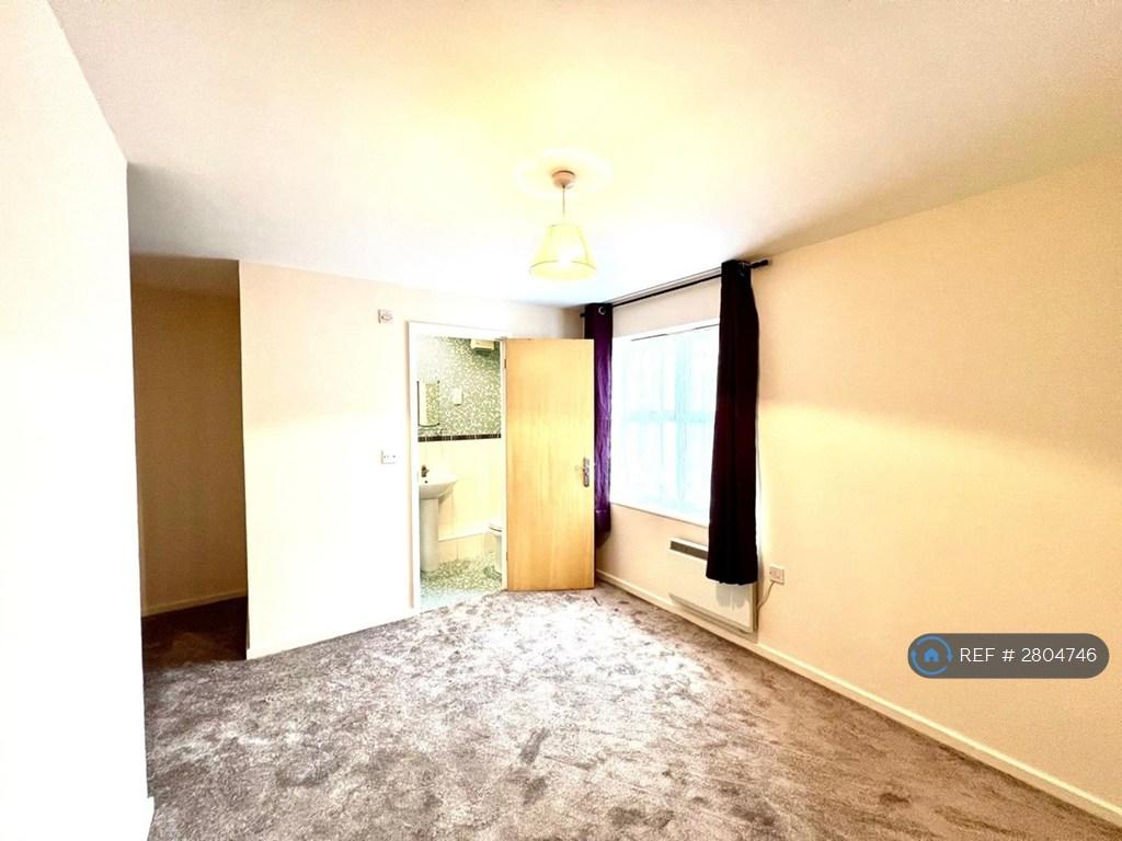 Master Bedroom With En-Suite Shower And Toilet