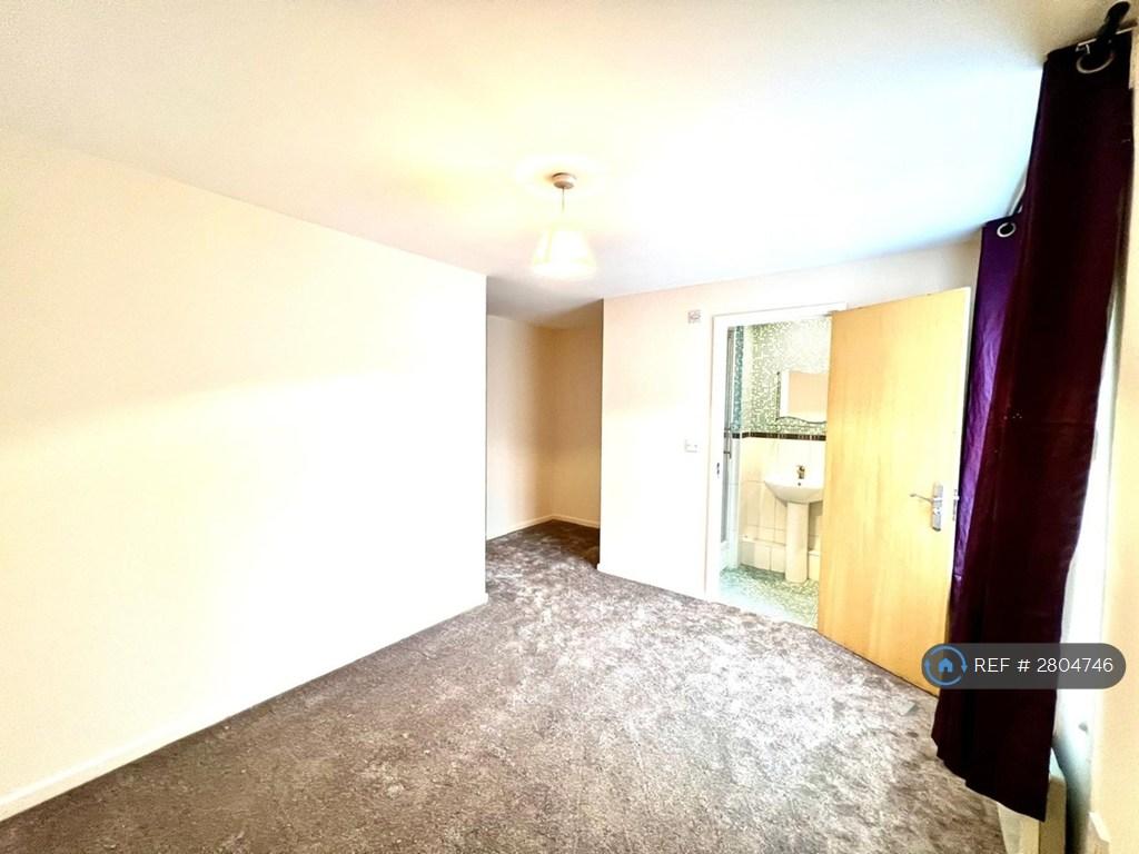 Master Bedroom With En-Suite Shower And Toilet