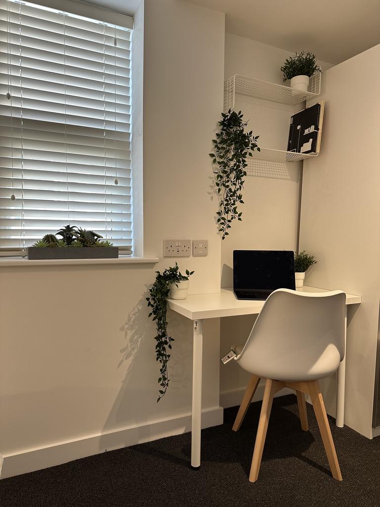 Desk and chair area of similar size and layout