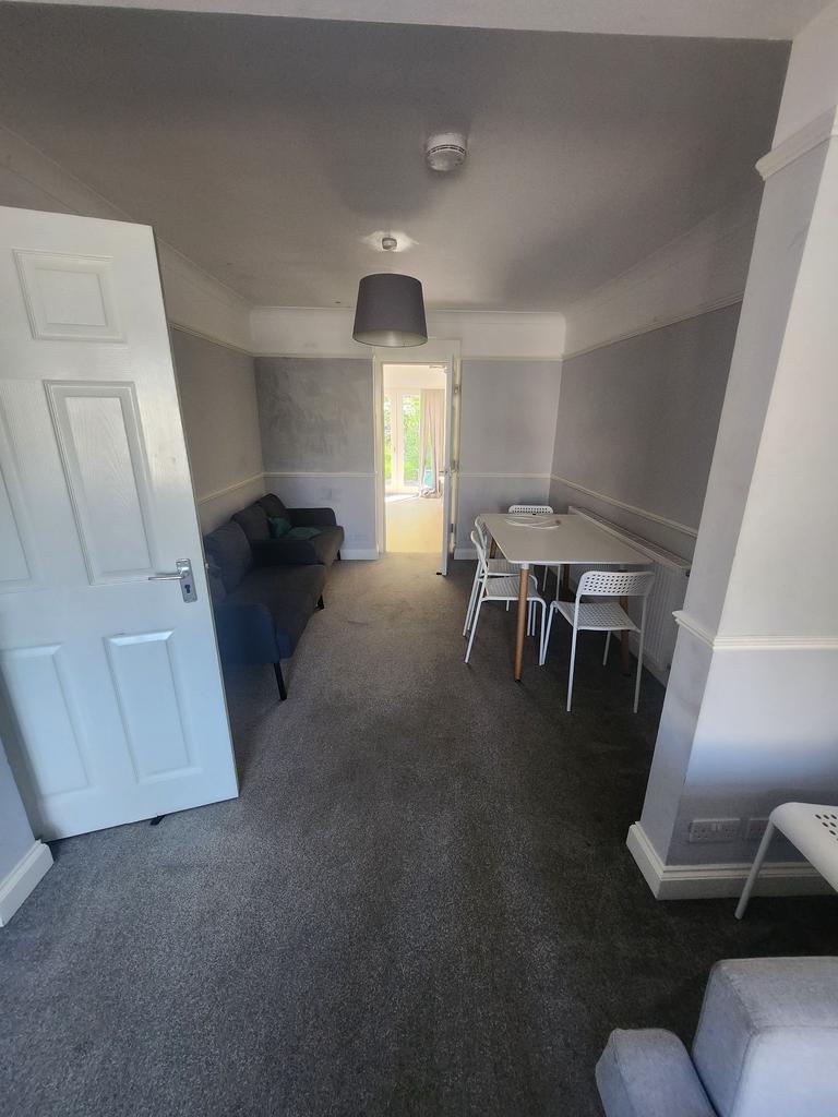 Well-presented living/dining room with neutral ...