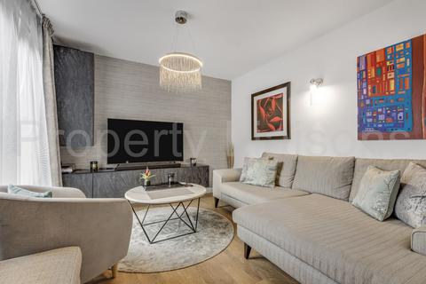 John Bowles Court, London, E1W