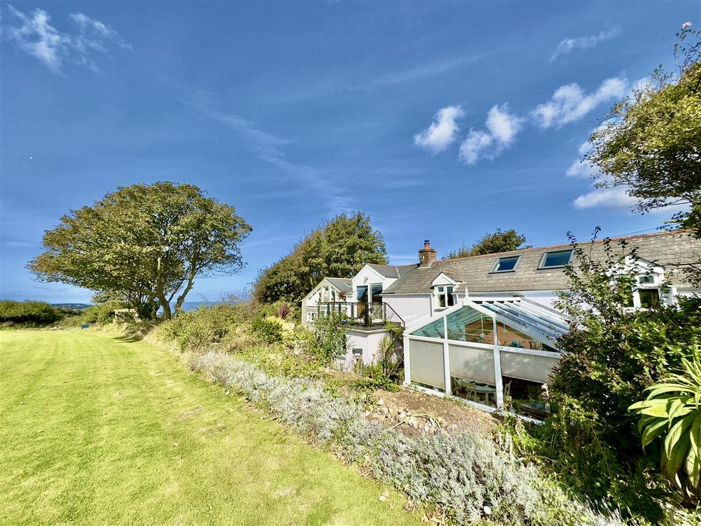 FRONT WITH LAWN.jpeg