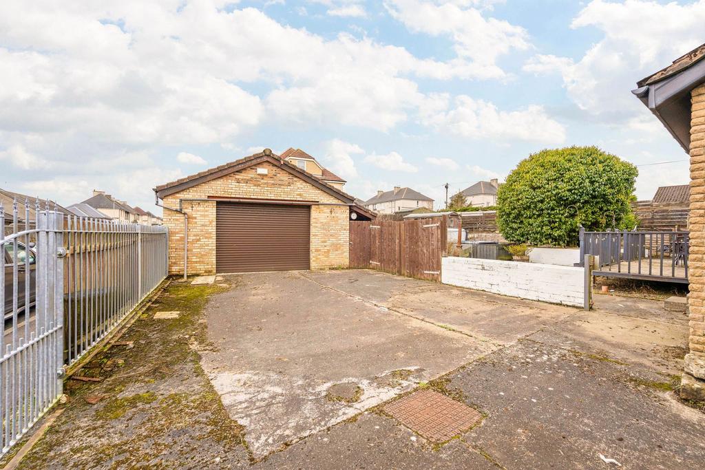 Detached Garage/ Driveway
