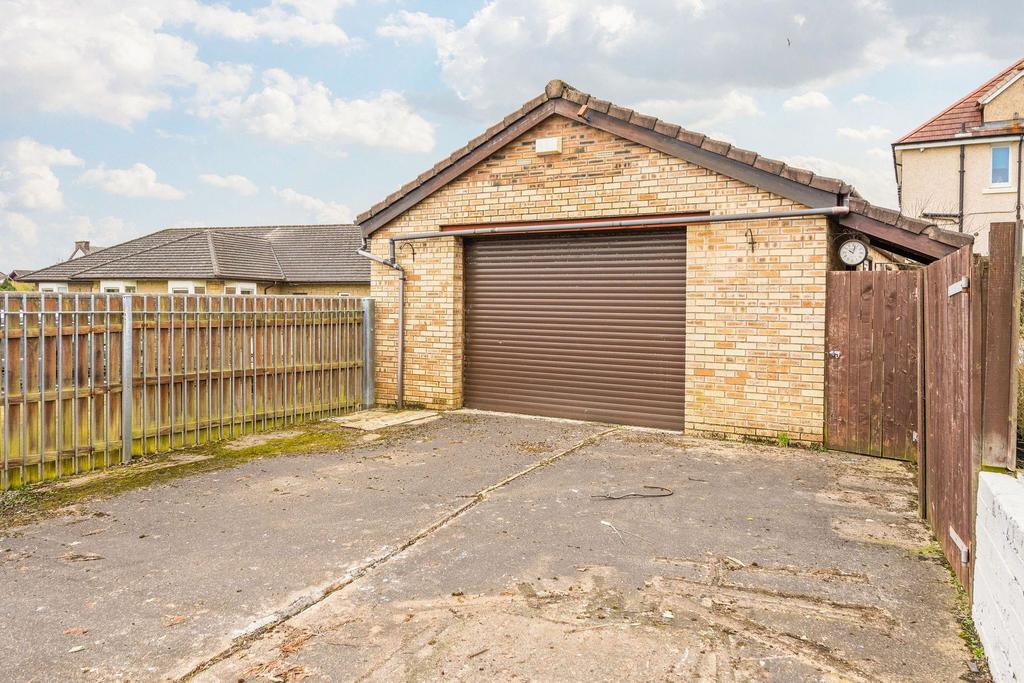 Detached Garage/ Driveway