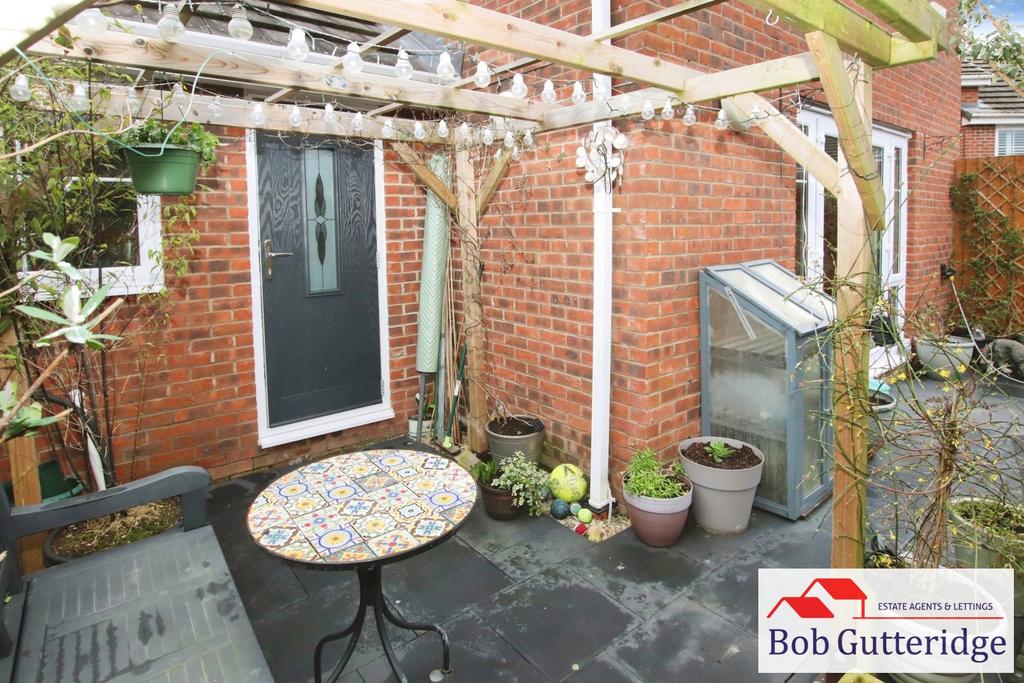 Enclosed landscaped rear garden