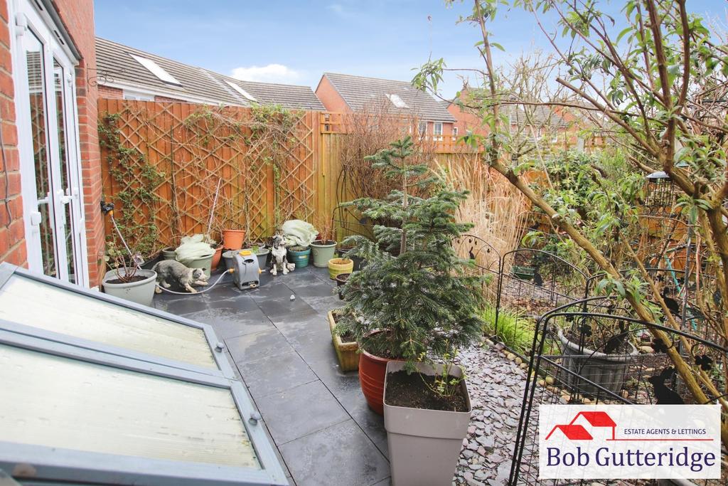 Enclosed landscaped rear garden