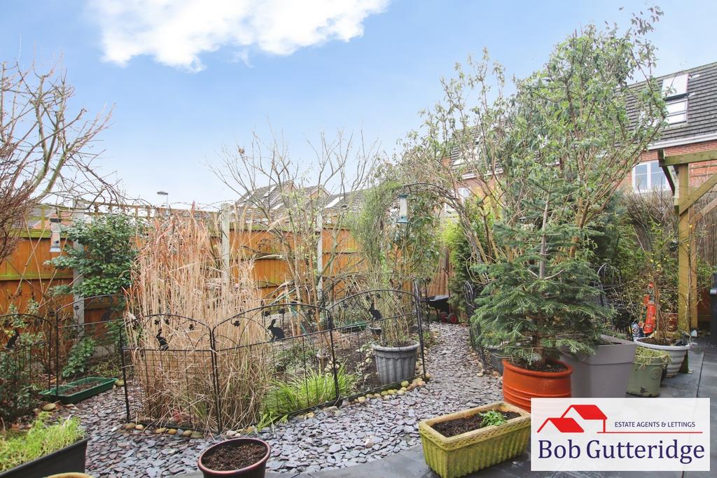 Enclosed landscaped rear garden