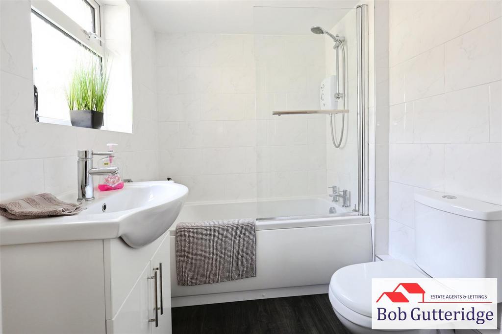 Ground floor fully tiled bathroom